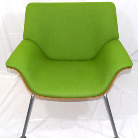 front view of Herman Miller Swoop plywood chair in green
